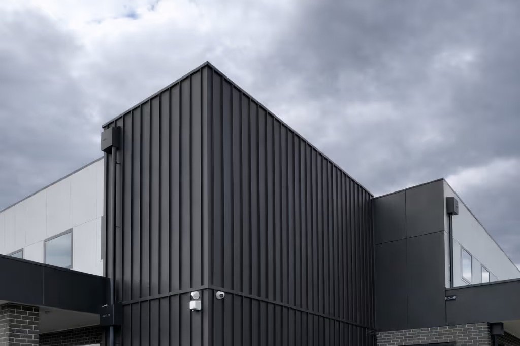 Black standing-seam cladding on Explorers Childcare, Essendon
